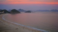 Travel Photo Thursday: Copacabana Beach at Sunset Copacabana Beach, Rio de Janeiro, Brazil This was the view from our hotel’s rooftop pool on world-famous Copacabana Beach in Rio de Janeiro, Brazil. Not bad, eh? After a whirlwind two-and-a-half weeklong trek from Rio to Buenos Aires to Punta del Este to Iguaçu Falls and back to...
