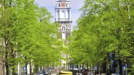 Amsterdam is one of the most picturesque cities in all of Europe. With its serene canals, historic gabled buildings, and elaborate church spires poking high above it all, you’re sure to catch that perfect photo. One of the best places is along Groenburgwal Canal. This shot shows the Zuiderkerk (“Southern Church”), a 17th Century Protestant church located in the Nieuwmarkt neighborhood. It was designed in the...